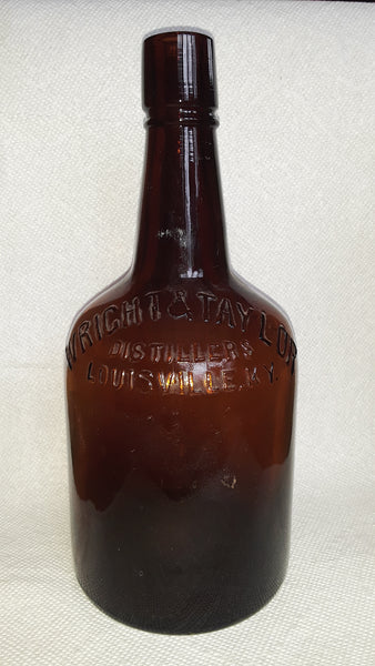 WRITE & TAYLOR DISTILLERS LOUISVILLE, KY. FULL QUART REGISTERED AMBER WHISKY BOTTLE