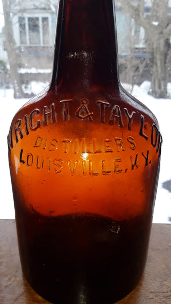 WRITE & TAYLOR DISTILLERS LOUISVILLE, KY. FULL QUART REGISTERED AMBER WHISKY BOTTLE