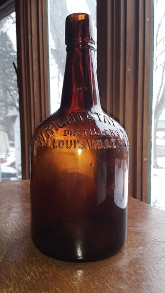WRITE & TAYLOR DISTILLERS LOUISVILLE, KY. FULL QUART REGISTERED AMBER WHISKY BOTTLE