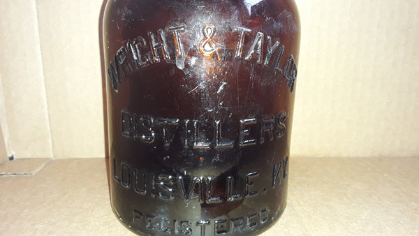WRITE & TAYLOR DISTILLERS LOUISVILLE, KY. REGISTERED FULL QUART AMBER WHISKY BOTTLE