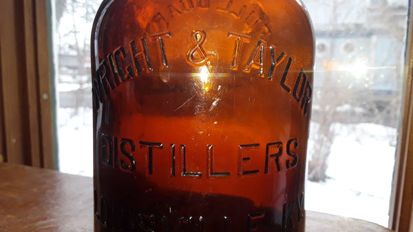 WRITE & TAYLOR DISTILLERS LOUISVILLE, KY. REGISTERED FULL QUART AMBER WHISKY BOTTLE